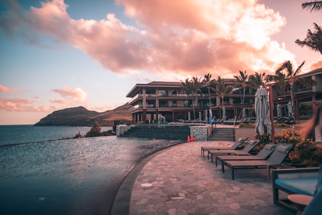 a beautiful beachfront hotel with an infinity pool